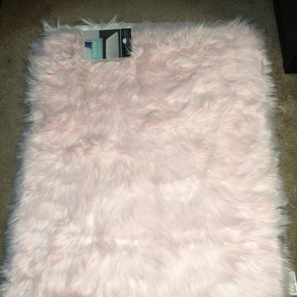 Furry pink rug